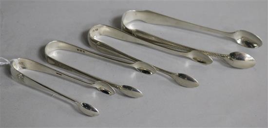 Four assorted pairs of Victorian silver sugar tongs, 4.8 oz.